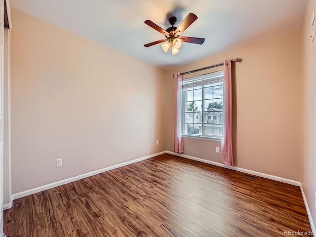 3708 S Lisbon Way, Aurora, CO 80013 - unfurnished room with ceiling fan and wood finished floors