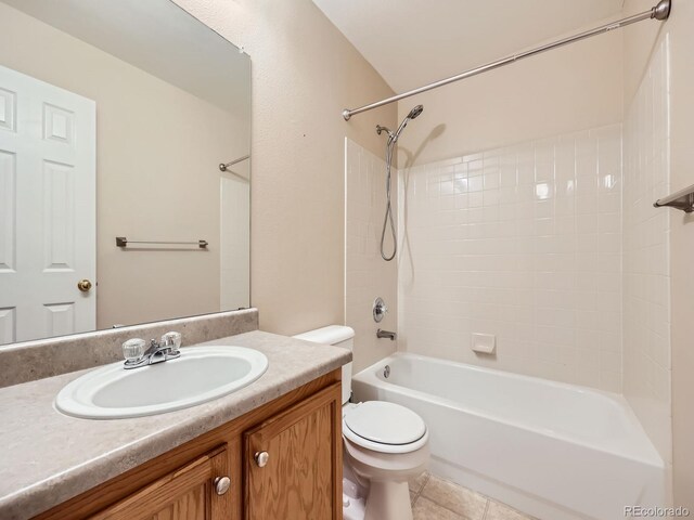 3708 S Lisbon Way, Aurora, CO 80013 - full bath featuring vanity, shower / washtub combination, and tile patterned floors
