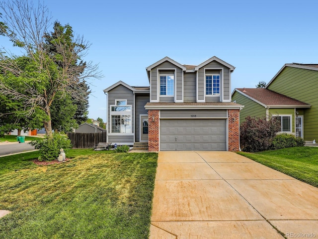 3708 S Lisbon Way, Aurora, CO 80013 - view of front facade featuring an attached garage, driveway, and brick siding
