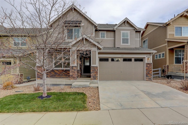 craftsman house with a garage