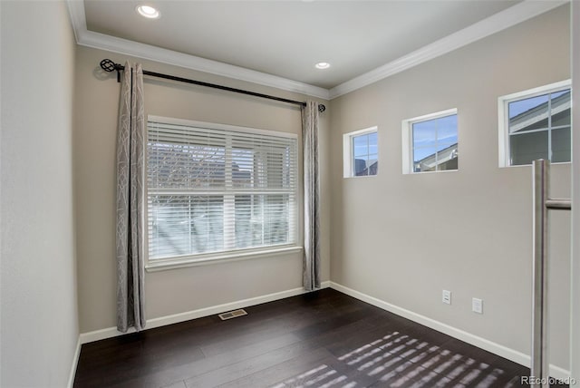 unfurnished room featuring ornamental molding and dark hardwood / wood-style floors