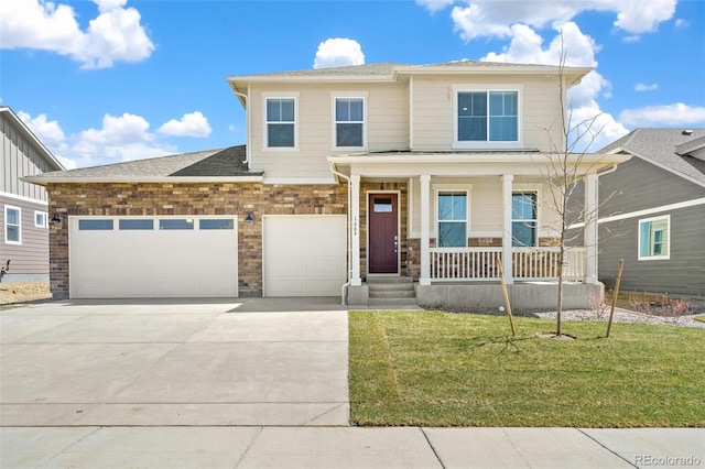 view of front of house featuring an attached garage, covered porch, brick siding, driveway, and a front lawn