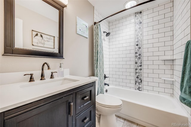 bathroom featuring shower / bath combo, vanity, and toilet