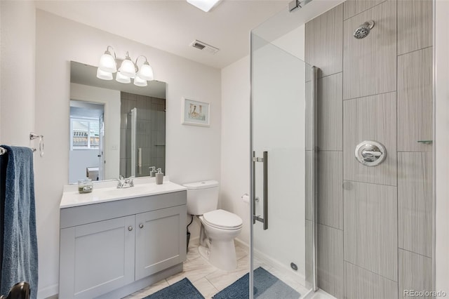 bathroom featuring visible vents, toilet, vanity, and a stall shower
