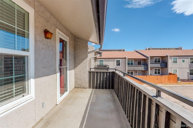 balcony featuring a residential view