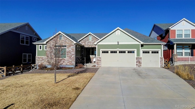 craftsman-style home with a garage