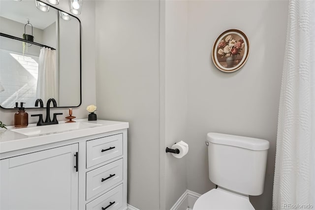 493 S Lincoln St, Denver, CO 80209 - full bath featuring vanity and toilet