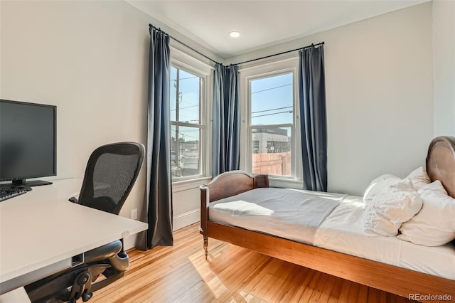 493 S Lincoln St, Denver, CO 80209 - bedroom featuring light wood-style flooring, baseboards, and recessed lighting
