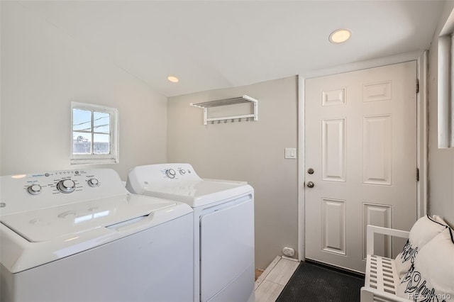 493 S Lincoln St, Denver, CO 80209 - laundry area with recessed lighting, washer and dryer, and laundry area