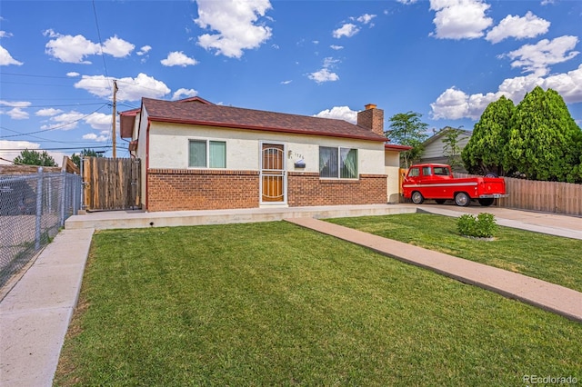 view of front of house with a front lawn