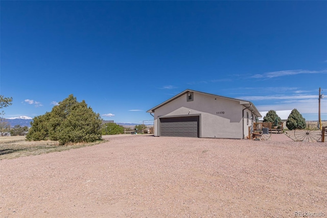 11170 Peaceful Valley Rd, Colorado Springs, CO 80925 - view of outdoor structure featuring driveway