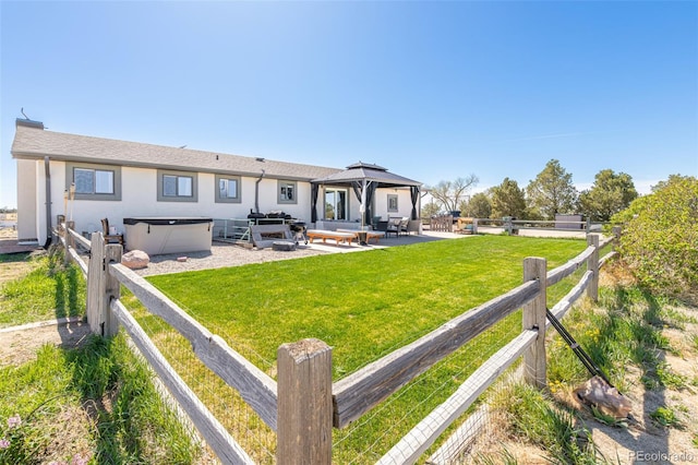 11170 Peaceful Valley Rd, Colorado Springs, CO 80925 - rear view of house with a gazebo, an outdoor hangout area, a patio area, and stucco siding
