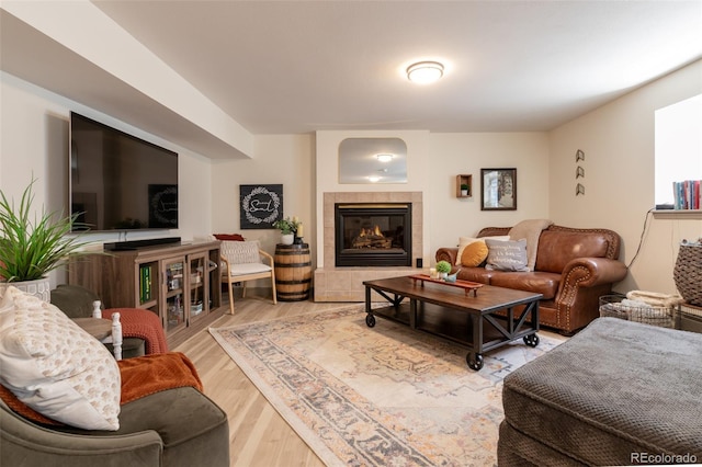 11170 Peaceful Valley Rd, Colorado Springs, CO 80925 - living room with wood finished floors and a tiled fireplace