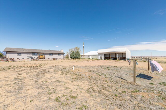 11170 Peaceful Valley Rd, Colorado Springs, CO 80925 - view of yard with an outbuilding and an outdoor structure