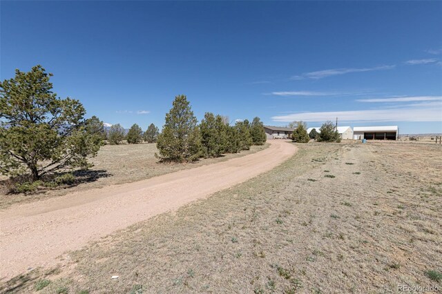 11170 Peaceful Valley Rd, Colorado Springs, CO 80925 - view of dirt / gravel driveway