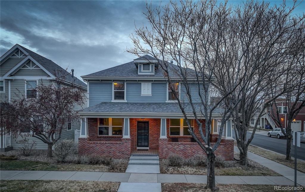 front facade featuring covered porch