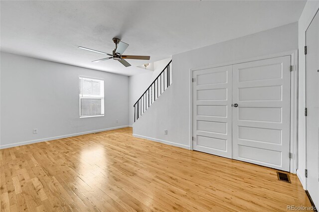 1431 Tamarac St, Denver, CO 80220 - unfurnished living room featuring light wood-type flooring, baseboards, a ceiling fan, and visible vents