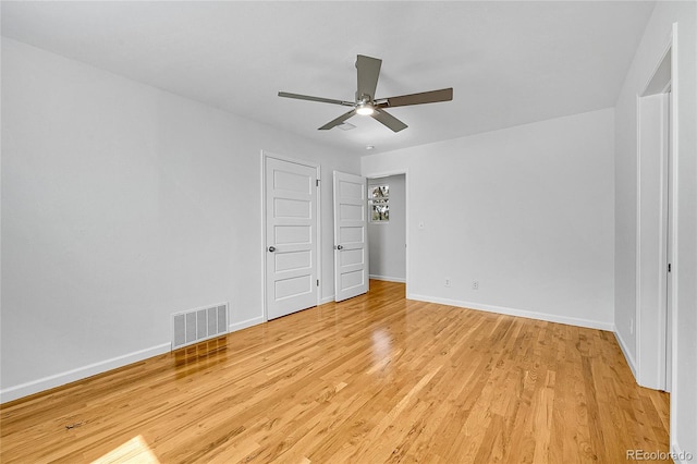 unfurnished bedroom with light wood-type flooring and ceiling fan