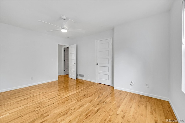 unfurnished room with ceiling fan and light hardwood / wood-style flooring