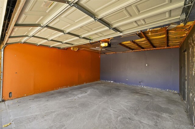 1431 Tamarac St, Denver, CO 80220 - garage featuring a garage door opener