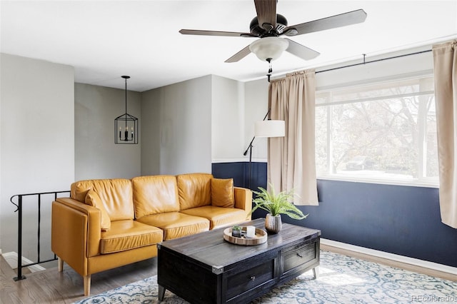 13055 E Dakota Ave, Aurora, CO 80012 - living area featuring wood finished floors and ceiling fan