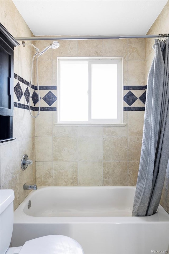 13055 E Dakota Ave, Aurora, CO 80012 - full bathroom with shower / bath combo with shower curtain and healthy amount of natural light