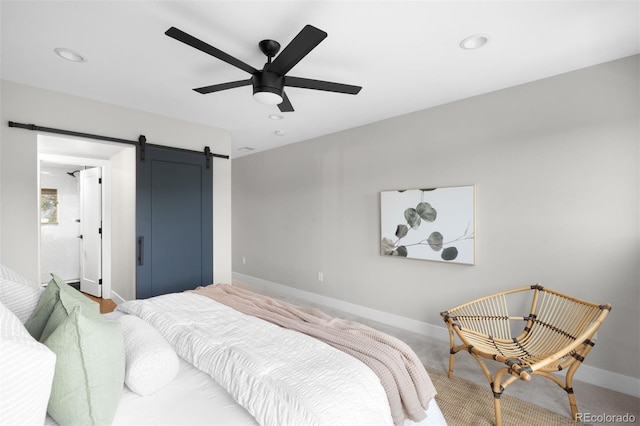 2179 S Bannock St, Denver, CO 80223 - bedroom featuring a barn door, recessed lighting, baseboards, and a ceiling fan