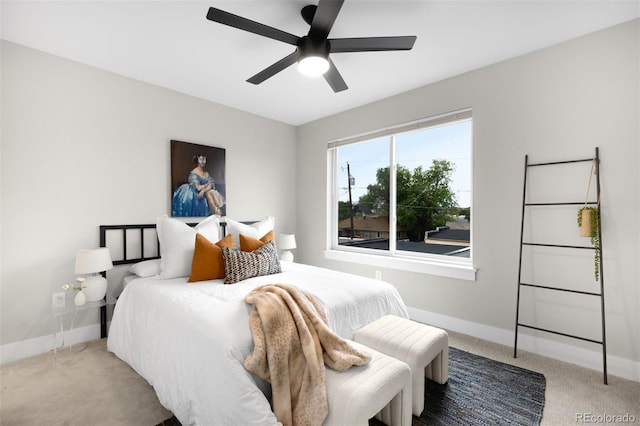 2179 S Bannock St, Denver, CO 80223 - bedroom with light carpet, baseboards, and a ceiling fan