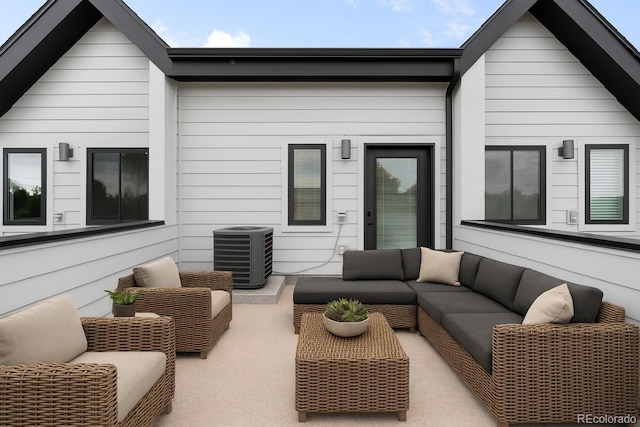 2179 S Bannock St, Denver, CO 80223 - back of property with outdoor lounge area, central air condition unit, and a patio