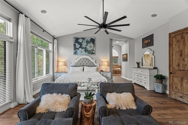 bedroom with lofted ceiling, ceiling fan, multiple windows, and dark hardwood / wood-style flooring