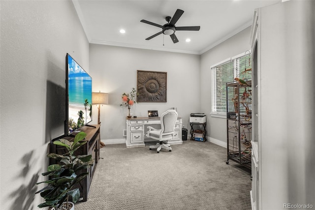 office space with crown molding, ceiling fan, and carpet floors