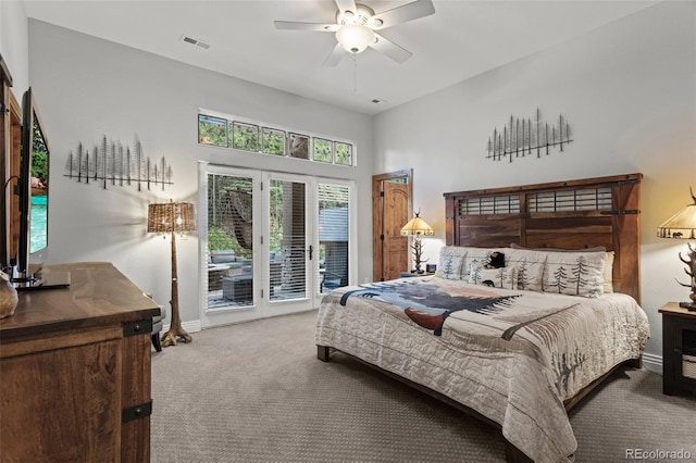 bedroom featuring access to outside, ceiling fan, and carpet floors