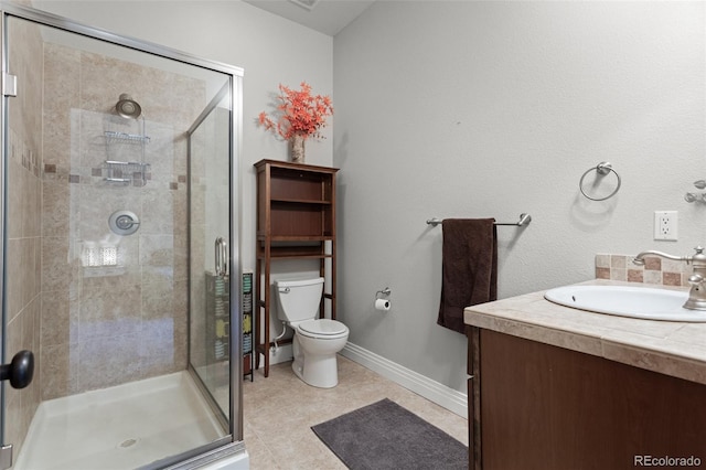 bathroom featuring a shower with shower door, tile patterned flooring, and toilet