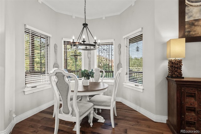 dining area featuring plenty of natural light and crown molding