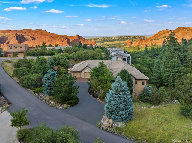 drone / aerial view featuring a mountain view