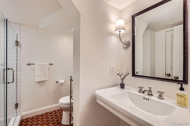 1224 Glencoe St, Denver, CO 80220 - bathroom featuring a shower stall and tile patterned floors