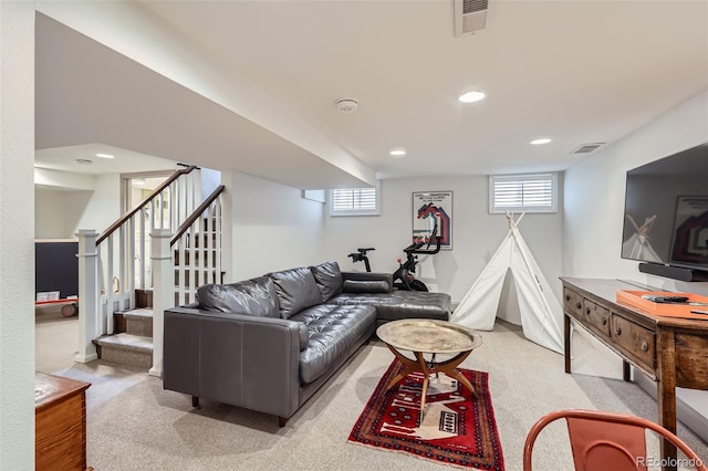 1224 Glencoe St, Denver, CO 80220 - carpeted living area with healthy amount of natural light, stairway, and recessed lighting