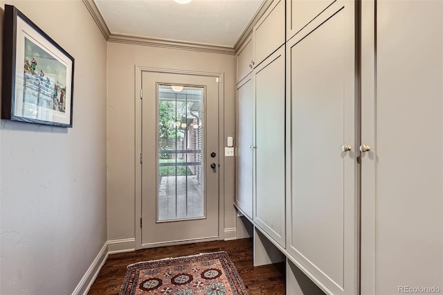 1224 Glencoe St, Denver, CO 80220 - doorway with crown molding and dark wood-style floors