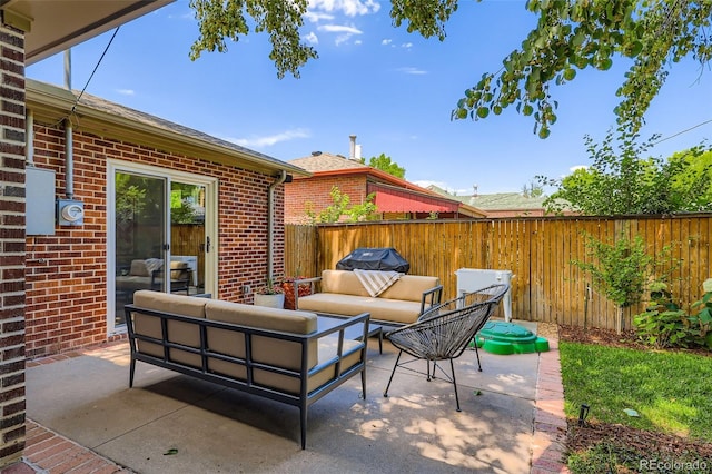 1224 Glencoe St, Denver, CO 80220 - fenced backyard featuring a patio area and outdoor lounge area