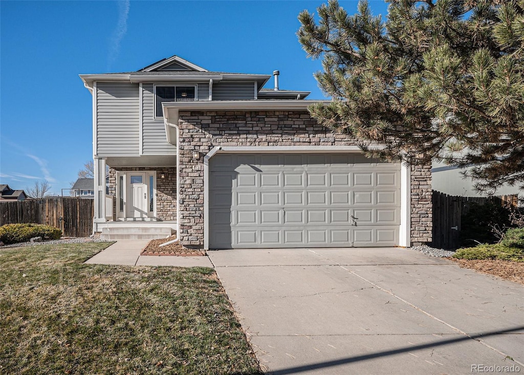 view of front of home with a garage