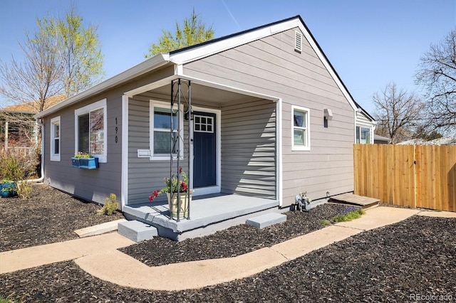 190 S Canosa Ct, Denver, CO 80219 - bungalow-style house with a porch and fence
