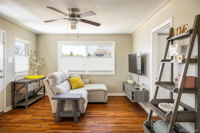 190 S Canosa Ct, Denver, CO 80219 - living area featuring a ceiling fan, plenty of natural light, and wood finished floors
