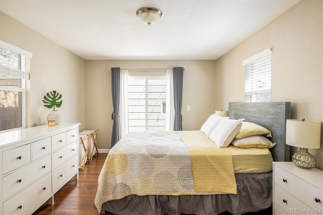 190 S Canosa Ct, Denver, CO 80219 - bedroom with dark wood-style floors and baseboards