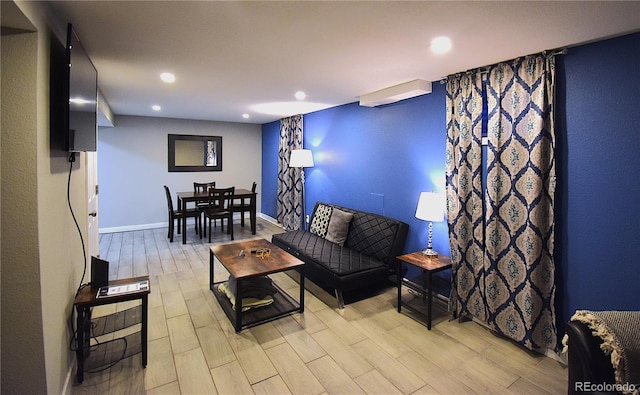 living room with light hardwood / wood-style floors