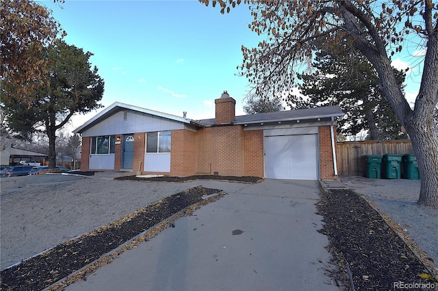 ranch-style home with a garage