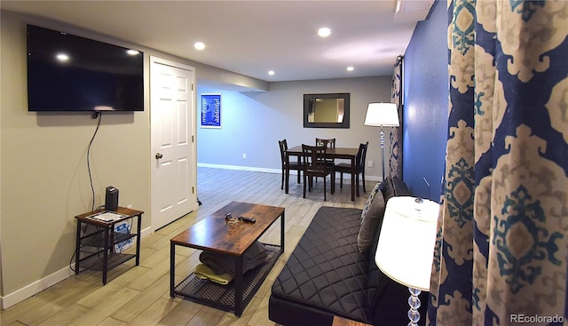 living room with light hardwood / wood-style floors