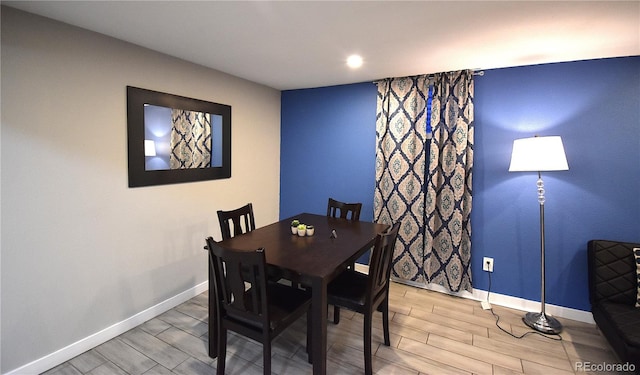 dining space featuring light hardwood / wood-style flooring