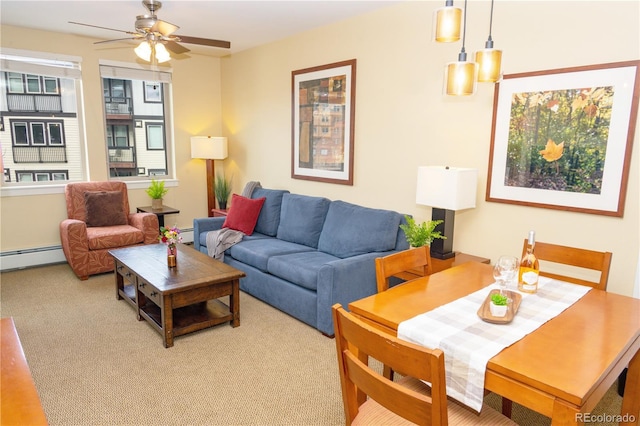 580 Winter Park Dr # 4571-4573, Winter Park, CO 80482 - carpeted living room featuring a ceiling fan and baseboard heating