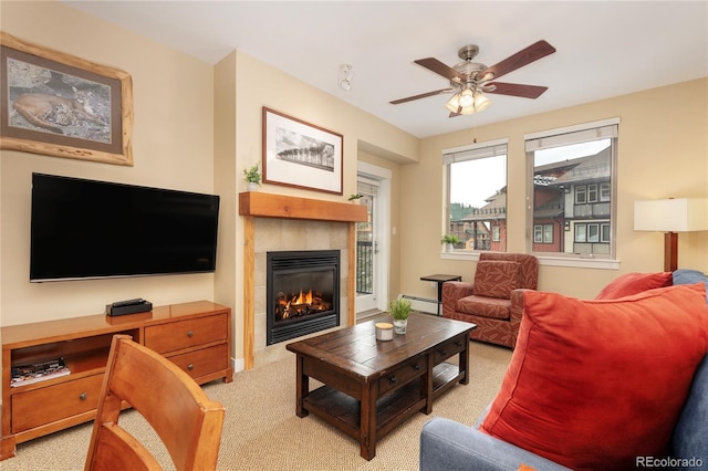 580 Winter Park Dr # 4571-4573, Winter Park, CO 80482 - living room with a tiled fireplace, baseboard heating, light colored carpet, and a ceiling fan