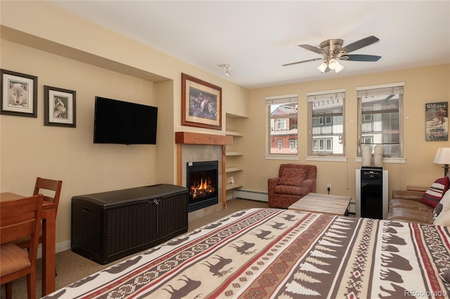 580 Winter Park Dr # 4571-4573, Winter Park, CO 80482 - bedroom with a baseboard radiator, a baseboard heating unit, a fireplace, and carpet